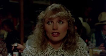 Movie still from “Tender Mercies” (1983), directed by Bruce Beresford – A person with long hair; Close Up shot, Over the shoulder angle