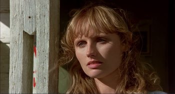 Movie still from “Tender Mercies” (1983), directed by Bruce Beresford – A person with long blonde hair; Close Up shot, Low angle