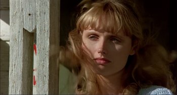 Movie still from “Tender Mercies” (1983), directed by Bruce Beresford – A beautiful woman with blonde hair looking at the camera; Close Up shot, Low angle