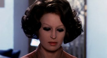 Movie still from “Teorema” (1968), directed by Pier Paolo Pasolini – A person wearing a dress; Close Up shot, Over the shoulder angle