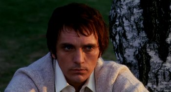 Movie still from “Teorema” (1968), directed by Pier Paolo Pasolini – A person wearing a shirt and tie; Close Up shot, Low angle