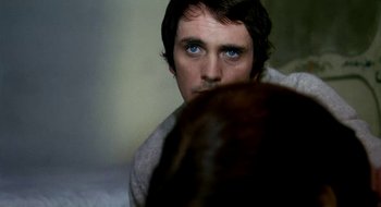 Movie still from “Teorema” (1968), directed by Pier Paolo Pasolini – A man with blue eyes looking into a mirror; Close Up shot, Over the shoulder angle