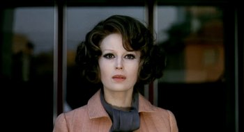 Movie still from “Teorema” (1968), directed by Pier Paolo Pasolini – A person with short hair wearing a jacket; Close Up shot, Low angle