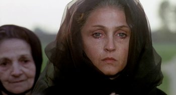 Movie still from “Teorema” (1968), directed by Pier Paolo Pasolini – A person wearing a black veil; Close Up shot, Over the shoulder angle