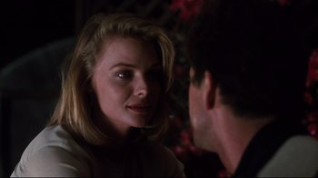Movie still from “Tequila Sunrise” (1988), directed by Robert Towne – A man and a woman talking to each other; Close Up shot, Over the shoulder angle