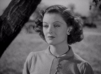 Movie still from “Test Pilot” (1938), directed by Victor Fleming – An old black and white photo of a woman; Close Up shot, High angle