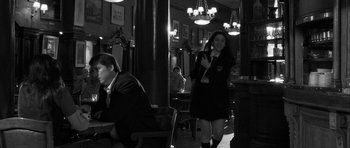 Movie still from “Tetro” (2009), directed by Francis Ford Coppola – A man and a woman are sitting in a restaurant; Wide shot, Over the shoulder angle