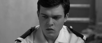 Movie still from “Tetro” (2009), directed by Francis Ford Coppola – Black and white photograph of a man in military uniform; Close Up shot, High angle