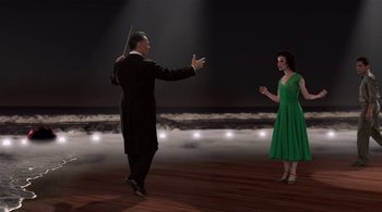 Movie still from “Tetro” (2009), directed by Francis Ford Coppola – A man and a woman are dancing on a stage; Wide shot, High angle
