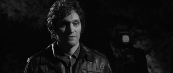 Movie still from “Tetro” (2009), directed by Francis Ford Coppola – Black and white photograph of a man wearing a leather jacket; Close Up shot, Over the shoulder angle