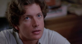 Movie still from “Tex” (1982), directed by Tim Hunter – A person looking at the camera; Close Up shot, Over the shoulder angle