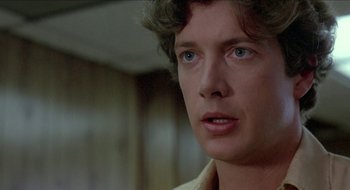 Movie still from “Tex” (1982), directed by Tim Hunter – A person looking at the camera; Close Up shot, Over the shoulder angle