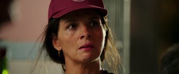 Movie still from “The 33” (2015), directed by Patricia Riggen – A person wearing a hat; Close Up shot, Over the shoulder angle