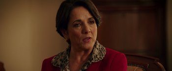 Movie still from “The 33” (2015), directed by Patricia Riggen – A person wearing a red jacket; Close Up shot, Over the shoulder angle