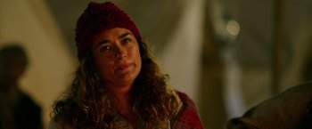 Movie still from “The 33” (2015), directed by Patricia Riggen – A person wearing a hat; Close Up shot, Over the shoulder angle