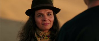 Movie still from “The 33” (2015), directed by Patricia Riggen – A person wearing a hat; Close Up shot, Over the shoulder angle
