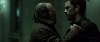 Movie still from “Department Q: The Absent One” (2014), directed by Mikkel Nørgaard – A man and a woman are talking to one another; Close Up shot, Over the shoulder angle