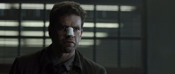 Movie still from “Department Q: The Absent One” (2014), directed by Mikkel Nørgaard – A man with a bandage on his nose; Close Up shot, Low angle