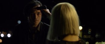 Movie still from “Department Q: The Absent One” (2014), directed by Mikkel Nørgaard – A man and a woman in front of a mirror; Close Up shot, Over the shoulder angle