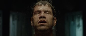 Movie still from “Department Q: The Absent One” (2014), directed by Mikkel Nørgaard – A person taking a shower; Close Up shot, Overhead angle