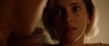 Movie still from “Department Q: The Absent One” (2014), directed by Mikkel Nørgaard – A woman's face in the dark; Close Up shot, Over the shoulder angle