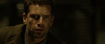 Movie still from “Department Q: The Absent One” (2014), directed by Mikkel Nørgaard – A person wearing a black shirt; Close Up shot, Low angle