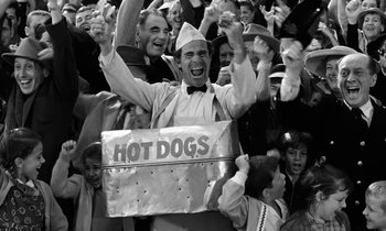 Movie still from “The Absent Minded Professor” (1961), directed by Robert Stevenson – A group of people that are standing in a crowd; Medium shot, High angle