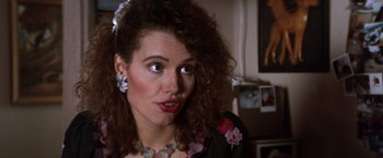 Movie still from “The Accidental Tourist” (1988), directed by Lawrence Kasdan – A person wearing a dress; Close Up shot, Over the shoulder angle