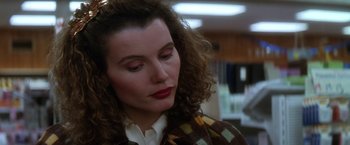 Movie still from “The Accidental Tourist” (1988), directed by Lawrence Kasdan – A person with curly hair wearing a sweater; Close Up shot, Low angle
