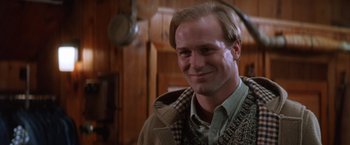 Movie still from “The Accidental Tourist” (1988), directed by Lawrence Kasdan – A person wearing a jacket; Close Up shot, Low angle