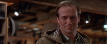 Movie still from “The Accidental Tourist” (1988), directed by Lawrence Kasdan – A person wearing a jacket; Close Up shot, Low angle