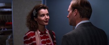 Movie still from “The Accidental Tourist” (1988), directed by Lawrence Kasdan – A man and a woman talking to each other; Close Up shot, Over the shoulder angle