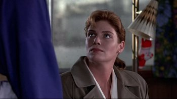 Movie still from “The Accused” (1988), directed by Jonathan Kaplan – A person wearing a jacket; Close Up shot, Over the shoulder angle