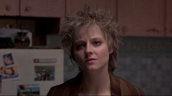 Movie still from “The Accused” (1988), directed by Jonathan Kaplan – A person wearing a jacket; Close Up shot, Low angle