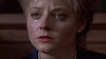 Movie still from “The Accused” (1988), directed by Jonathan Kaplan – A person with a tear in her eye; Close Up shot, Low angle