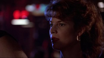 Movie still from “The Accused” (1988), directed by Jonathan Kaplan – A person wearing a red lipstick; Close Up shot, Low angle