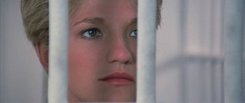 Movie still from “The Adventures of Buckaroo Banzai Across the 8th Dimension” (1984), directed by W.D. Richter – A person with blue eyes; Close Up shot, Low angle