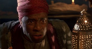 Movie still from “The Adventures of Huck Finn” (1993), directed by Stephen Sommers – A person wearing a turban; Close Up shot, Low angle