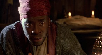 Movie still from “The Adventures of Huck Finn” (1993), directed by Stephen Sommers – A person wearing a hat; Close Up shot, Low angle