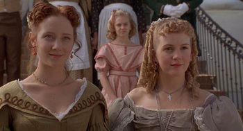 Movie still from “The Adventures of Huck Finn” (1993), directed by Stephen Sommers – A group of young women standing next to each other; Close Up shot, Low angle
