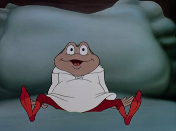Movie still from “The Adventures of Ichabod and Mr. Toad” (1949), directed by Jack Kinney – A cartoon of a frog sitting on the ground; Medium shot, High angle