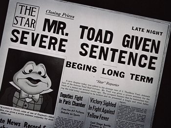Movie still from “The Adventures of Ichabod and Mr. Toad” (1949), directed by Jack Kinney – An old newspaper with an advertisement for a cartoon character; Extreme Close Up shot, Low angle