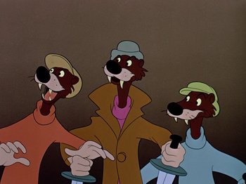Movie still from “The Adventures of Ichabod and Mr. Toad” (1949), directed by Jack Kinney – A group of three cartoon dogs standing next to each other; Medium shot, Low angle