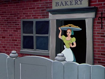 Movie still from “The Adventures of Ichabod and Mr. Toad” (1949), directed by Jack Kinney – An animated woman holding a plate of food; Wide shot, Low angle