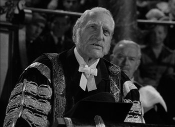 Movie still from “The Adventures of Mark Twain” (1944), directed by Irving Rapper – An old man wearing a suit and bow tie; Close Up shot, Low angle
