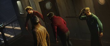 Movie still from “The Adventures of Tintin” (2011), directed by Steven Spielberg – A group of people standing next to each other in a room; Medium shot, High angle