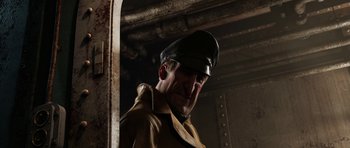 Movie still from “The Adventures of Tintin” (2011), directed by Steven Spielberg – A man wearing a hat and a leather jacket; Close Up shot, Low angle