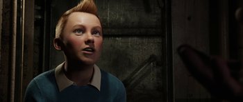 Movie still from “The Adventures of Tintin” (2011), directed by Steven Spielberg – A man with a spiky mohawk is looking up; Close Up shot, Low angle