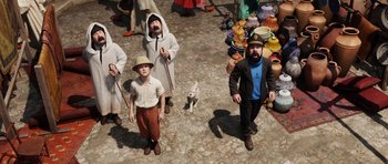 Movie still from “The Adventures of Tintin” (2011), directed by Steven Spielberg – A group of people standing next to each other on the ground; Wide shot, High angle