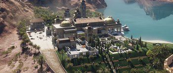 Movie still from “The Adventures of Tintin” (2011), directed by Steven Spielberg – An aerial view of a palace with a lake in the background; Extreme Wide shot, High angle